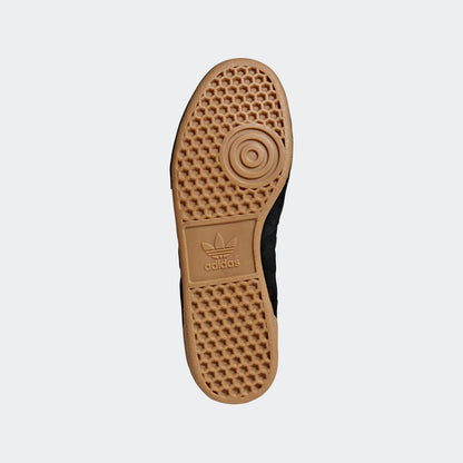 Hoofdafbeelding van de zwarte en witte Adidas Mundial Goal zaalvoetbalschoenen met non-marking zool, verkrijgbaar bij Kickoff Antwerpen voetbalshop.