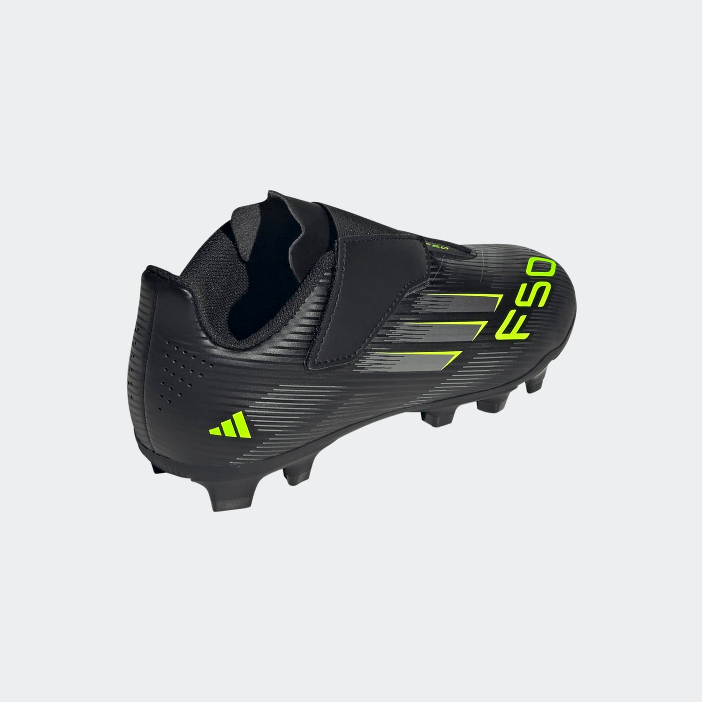 Adidas F50 Club Junior VEL FG/MG voetbalschoen met klittenband, zwart/geel/ design . Te koop bij Kickoff Antwerpen de voetbalshop
