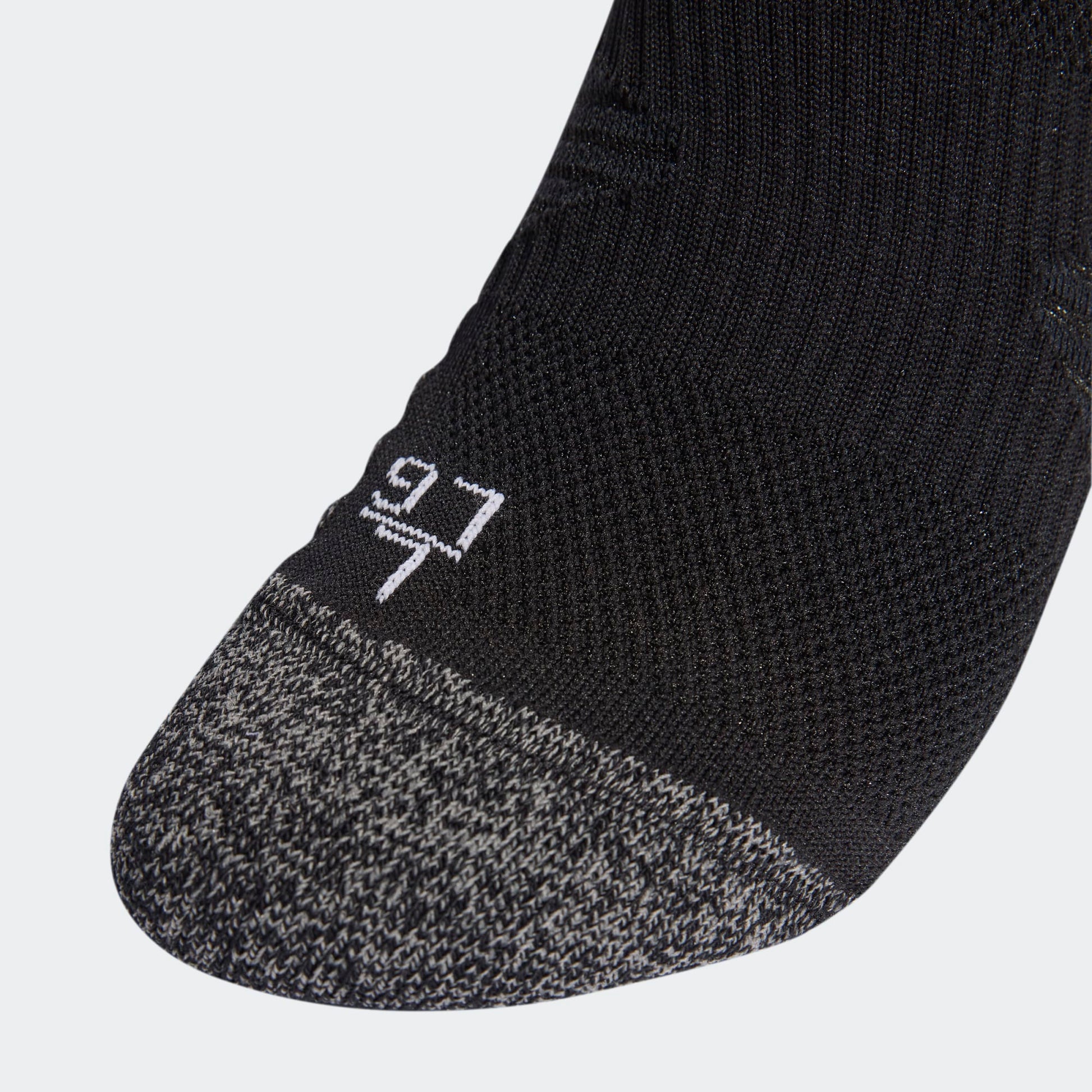 Adidas Originals RBFA België uit voetbalsokken 2026-2028 met zwarte accenten en bondslogo, verkrijgbaar bij voetbalshop Kickoff Antwerpen.