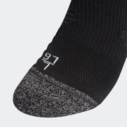 Adidas Originals RBFA België uit voetbalsokken 2026-2028 met zwarte accenten en bondslogo, verkrijgbaar bij voetbalshop Kickoff Antwerpen.
