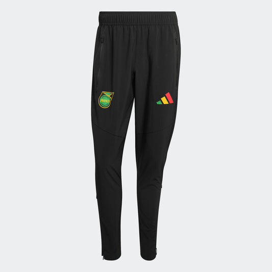 Zwarte Adidas JFF Jamaica Tracksuit Pants met geel-groene details, ode aan Bob Marley, verkrijgbaar bij voetbalshop Kickoff Antwerpen
