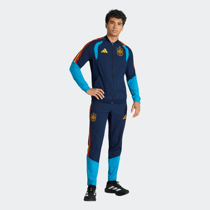 Adidas RFEF Presentatie Broek 2025/2026 – Heren – Donkerblauw – rood geel Kickoff Antwerpen voetbalshop 