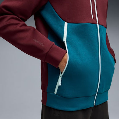 Puma FPF Portugal PumaTech Full Zip Hoodie Trainingspak 2026-2028 in marineblauw met officieel Portugees bondsembleem, verkrijgbaar bij Kickoff Antwerpen dé voetbalshop van stad.