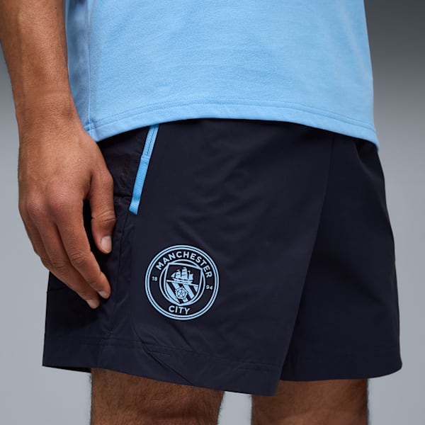 Puma Manchester City PUMATECH RELAXED WOVEN SHORTS 2025 2026 casual geweven short, comfortabele pasvorm, Kickoff Antwerpen de voetbalshop van Antwerpen.