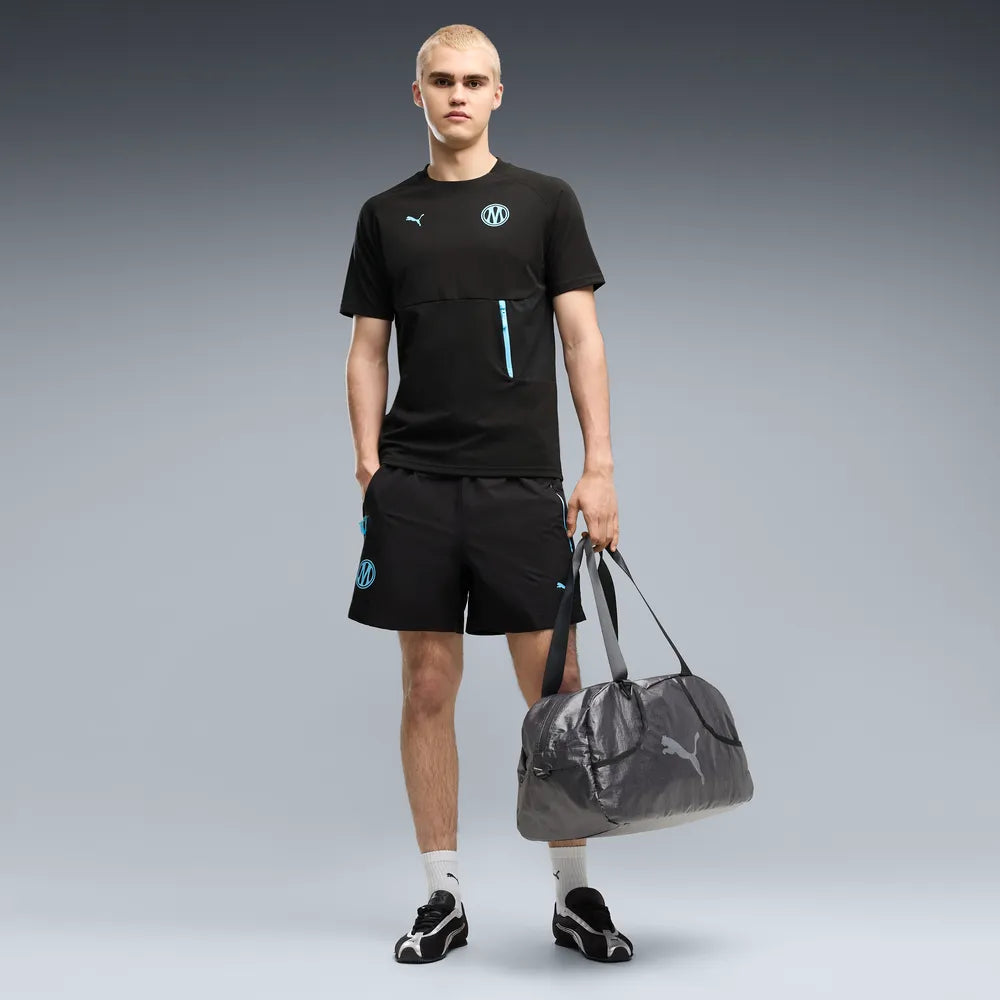 Puma Olympique Marseille Pumatech relaxed fit korte broek sportbroek met clubdetails op model Kickoff Antwerpen