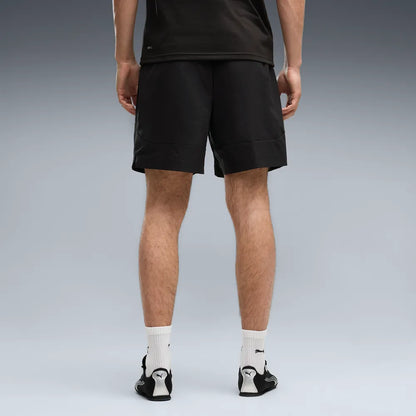 Puma Olympique Marseille Pumatech relaxed fit korte broek sportbroek met clubdetails op model Kickoff Antwerpen